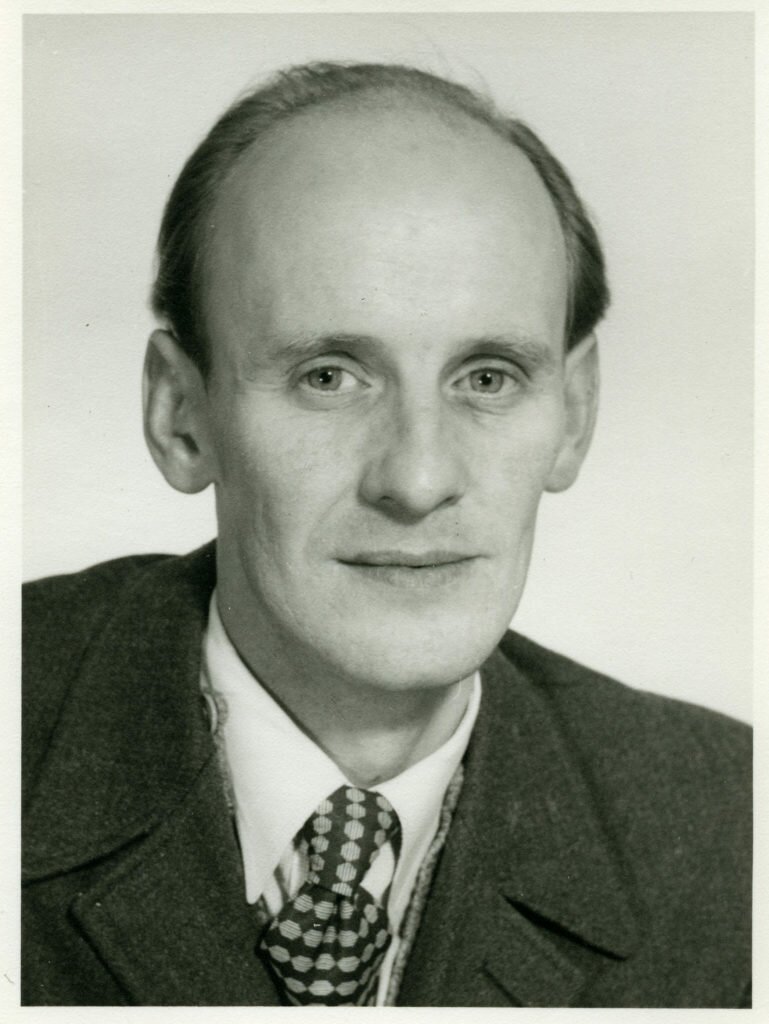 Porträttfoto av man i 60-årsåldern.